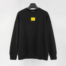 아크네 옐로우 로고 맨투맨